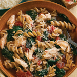 Bowl of low carb chicken, pasta and spinach soup