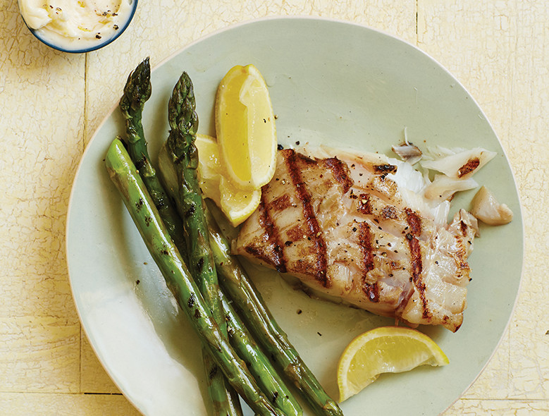 Buttery Lemon Grilled Fish On Grilled Asparagus